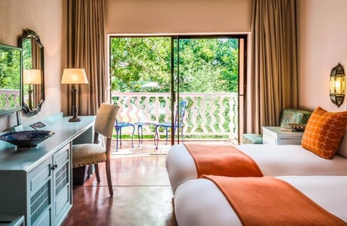 Livingstone House | Victoria Falls Adventure: Poolside Relaxation Near The Big Tree