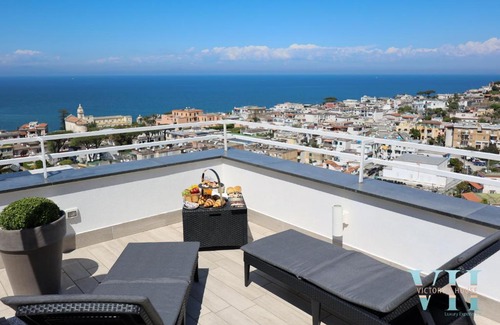 Casamicciola Terme Villa | Victory's Elegant House with Rooftop Jacuzzi and Ocean View