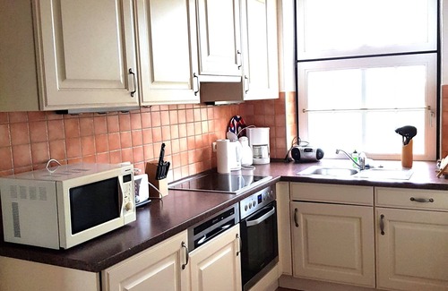 Fehmarn Apartment | View of the garden & fields, pets allowed