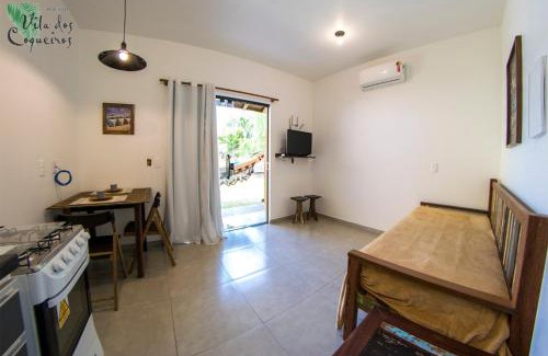 Praia do Rosa Hotel | Discover Vila dos Coqueiros: Pet-Friendly with Pool & Breakfast