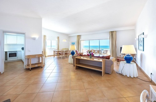 Meia Praia Apartment | Experience Vila Palmeira: Oceanfront Escape with Spa & Pool