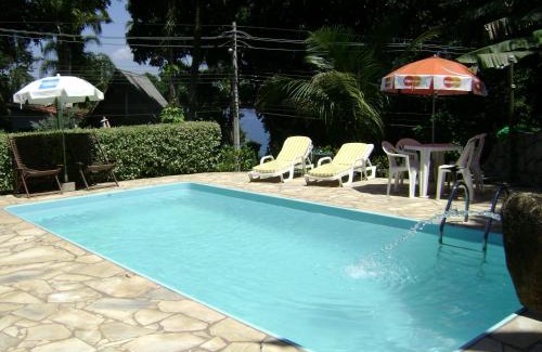 Sao Pedro Apartment | Discover Vila São Pedro: Oceanfront Oasis with Pool