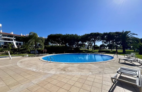 Quarteira Apartment | VILAMOURA SUNNY GARDEN WITH POOL by HOMING
