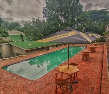 Blantyre Cabin | Villa 33: Family-Friendly Getaway with Pool and Spa