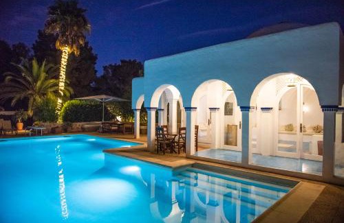 Santa Eulalia del Rio Villa | Relaxing Casa Cigala: 8 Bedrooms with Oceanfront Views