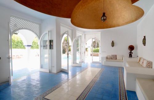 Santa Eulalia del Rio Villa | Relaxing Casa Cigala: 8 Bedrooms with Oceanfront Views