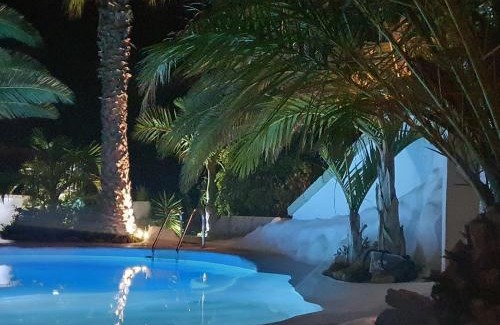 Arico House | Experience Villa Adriano: 4-Star Stay with Oceanfront Pool