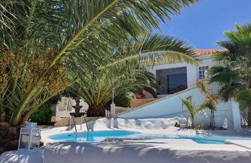 Arico House | Experience Villa Adriano: 4-Star Stay with Oceanfront Pool