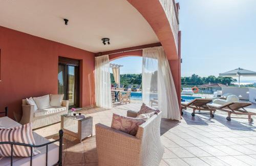 Alikias Villa | Elegant Villa Amaryllis with Oceanfront Views & Hot Tub