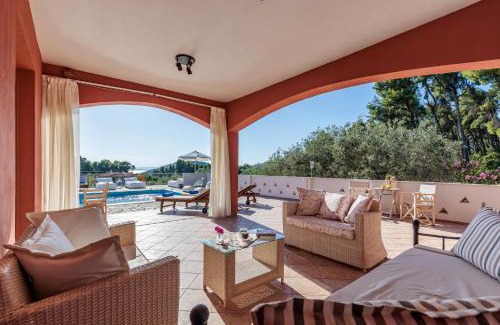 Alikias Villa | Elegant Villa Amaryllis with Oceanfront Views & Hot Tub