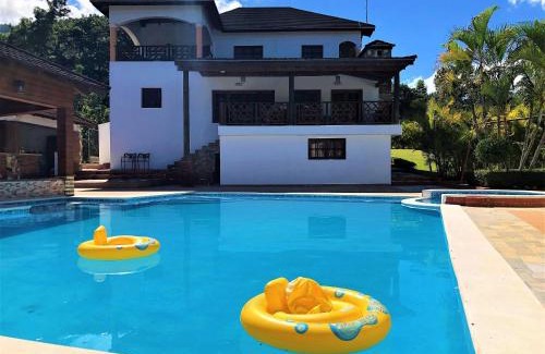 La Vega Province House | Villa Amila: Ideal Getaway with Pool & Hot Tub for 20