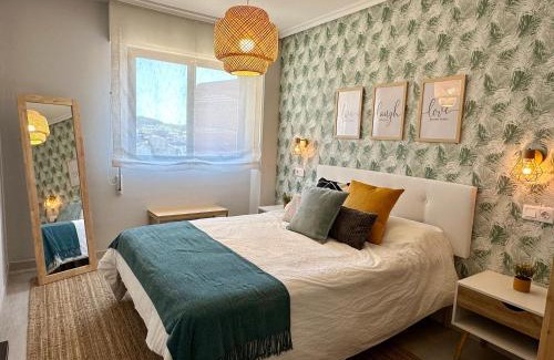 Aviles Apartment | Villa Ana: Central, Serene Retreat with Family-Friendly Perks