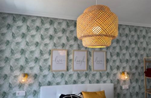 Aviles Apartment | Villa Ana: Central, Serene Retreat with Family-Friendly Perks