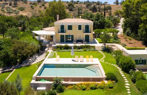 Kilada Villa | Villa Aria: Beachfront Retreat with Pool & Tennis Court