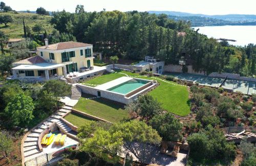 Kilada Villa | Villa Aria: Beachfront Retreat with Pool & Tennis Court
