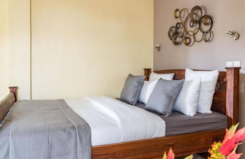 Arusha Hotel | Villa Arumeru - Deluxe Double Room with Balcony Awaits