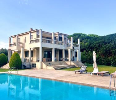Pyrgos Villa | Villa Astoria: Premier Oceanfront Retreat, Guest Rated 9.8