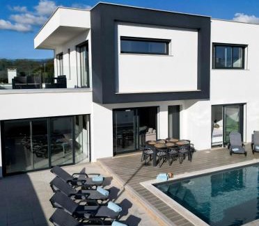 Atalaia Villa | Villa Atlantica One: Oceanfront Escape with Pool & 9.4 Rating