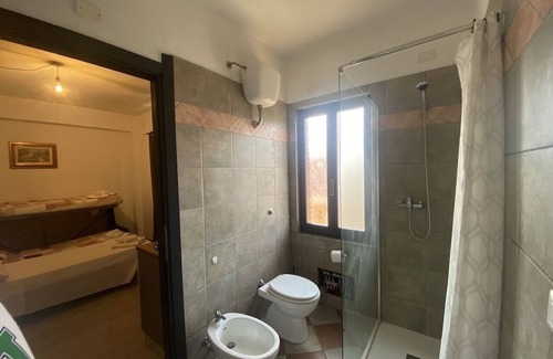 Assemini Apartment | Family-Friendly Villa Axes with Kitchen Amenities Await You