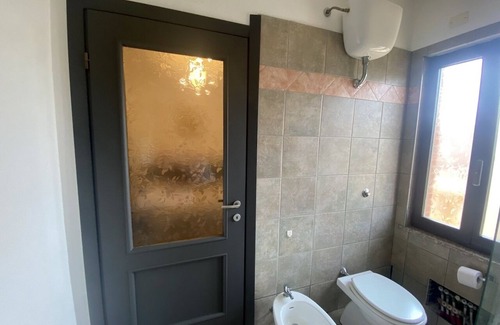 Assemini Apartment | Family-Friendly Villa Axes with Kitchen Amenities Await You
