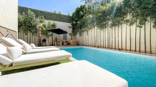 Annakhil Villa | Villa AZUR: Poolside Paradise in Marrakech with Ocean Views