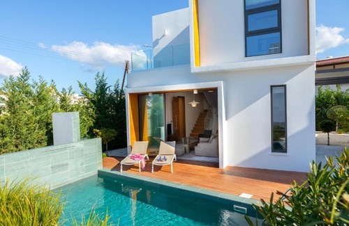 Paphos Villa | Beachside Villa Heaven: Steps from the Ocean and Family-Friendly