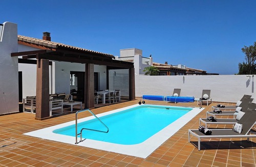 Caleta de Fuste Villa | Villa BELLA: Oceanfront Getaway with Private Pool & Spa