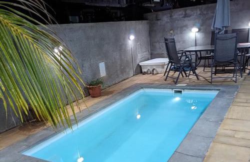 Pointe Aux Sables House | Villa Belle: Family-Friendly Getaway with Pool & Top Rating