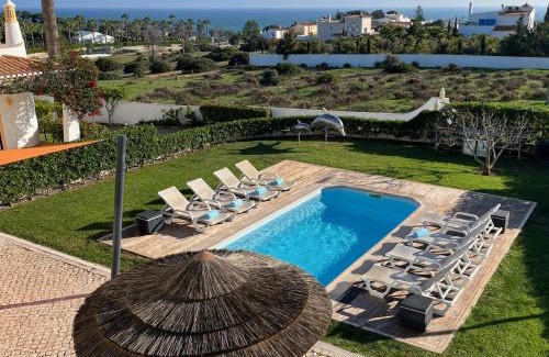 Albufeira Apartment | Villa Bellevue 4: Oceanfront Bliss with Pool & Kids' Fun