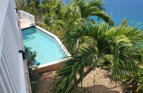 Great Cruz Bay Apartment | Villa Belvedere Oceanfront Suite A with a secluded pool and an AMAZING view!