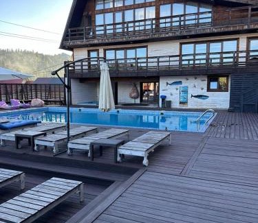 Polyanytsya Hotel | Villa Blanc: Oceanfront Retreat with Pool & Family-Friendly Perks