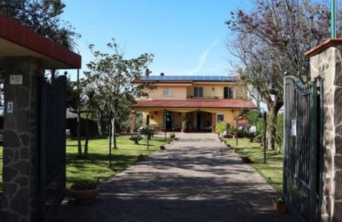 Agropoli House | Villa Brunella: Quadruple Room with Garden View