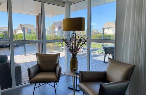 Delfstrahuizen Villa | Inviting Villa with Sauna and Scenic Views for Families