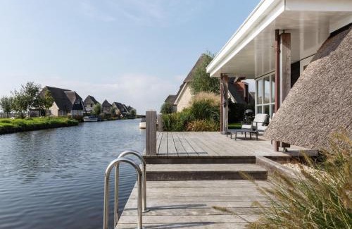 Delfstrahuizen Villa | Elegant Villa with Gas Fireplace, Pet & Child Friendly