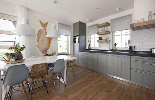 Delfstrahuizen Villa | Elegant Villa with Gas Fireplace, Pet & Child Friendly