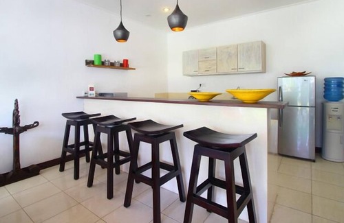 Batubelig Villa | Villa Calypso: Oceanfront Escape Steps from Batubelig Beach