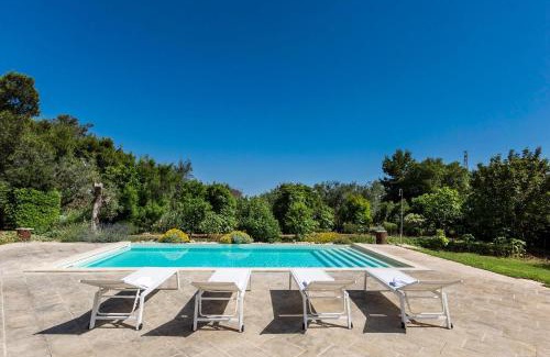 Manfio Villa | Villa Chiara: 4-Star Family Retreat with Pool Access