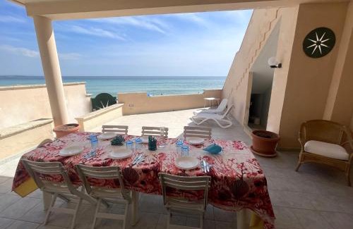 Torre Lapillo Villa | Beachfront Villa with Veranda and Pet-Friendly Amenities