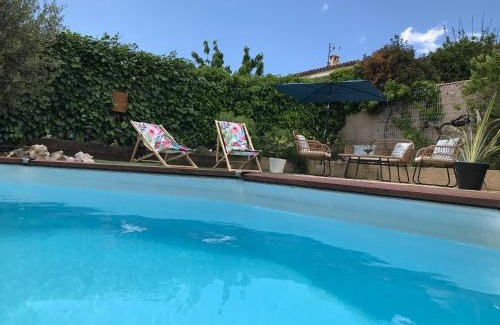 Carnoux-en-Provence Villa | Tranquil Villa Cléa: Garden Oasis with Pool & Ocean Views