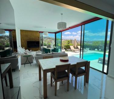 Salobre Villa | Relax at Villa Cooper: Oceanfront Stay with Pool Access