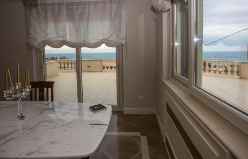 Palma di Montechiaro Villa | Idyllic Villa Corbera Palmaris with Oceanfront Pool