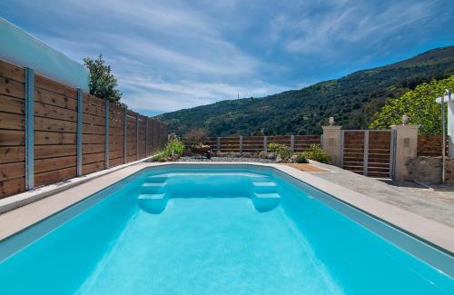 Rodakino Villa | Villa Cosmakis: Oceanfront Bliss with Pool & Hot Tub