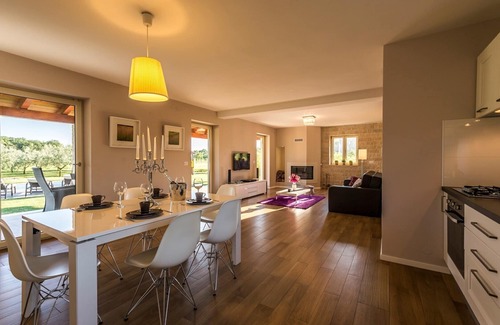 Kadumi Villa | Villa Danelon: Poolside Retreat with Olive Grove Views
