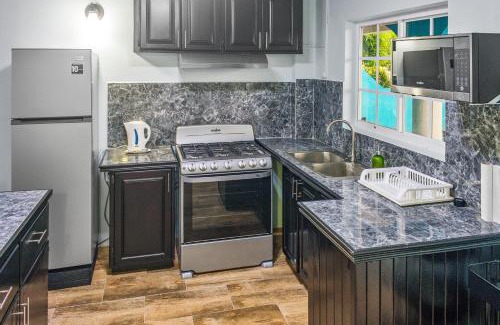 Scarborough Apartment | Pet-Friendly Groovy Suite at Villa De Cruz - Rated 8.5/10