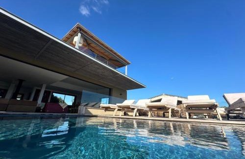 Pianotolli-Caldarello Villa | Oceanfront Villa with Infinity Pool & 4-Star Comfort