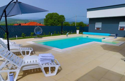 Mali Radic Villa | Experience Villa De Luxe Infinity with Oceanfront Pool Access