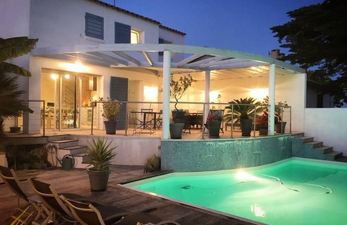 La Bree-les-Bains Villa | Villa de Standing: Oceanfront Oasis with Heated Pool