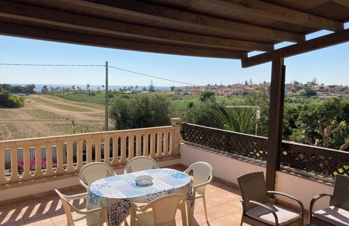 Reitani Villa | Villa Del Lentisco: Oceanfront Retreat with Free Wi-Fi