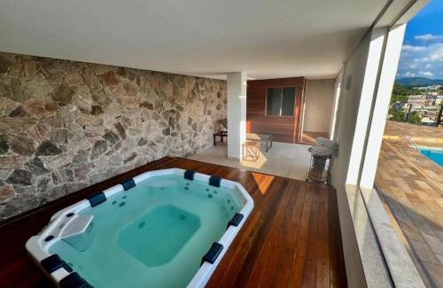 Lindoia Hotel | Experience Villa do Éden: Poolside Oceanfront Getaway