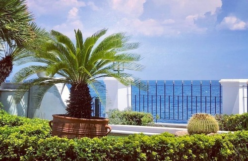 Egira Villa | Villa Dolphin: Beachfront Maisonette with Pool & Spa